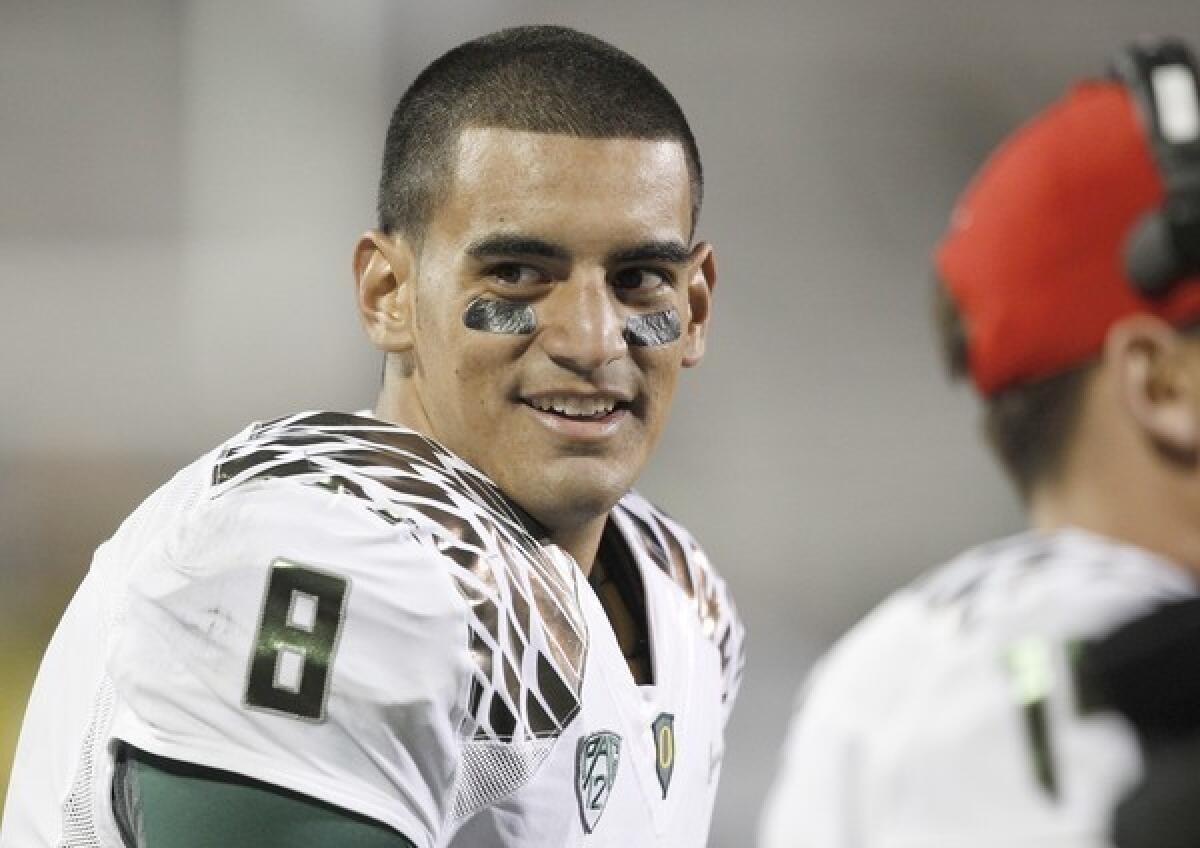 Oregon quarterback Marcus Mariota has lit up opposing defenses for 1,358 yards and 14 touchdowns with no interceptions for the Ducks through five games this season.