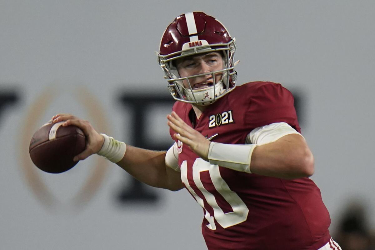 Alabama quarterback Mac Jones passes against Ohio State during the second half of an NCAA College Football Playoff national championship game, Monday, Jan. 11, 2021, in Miami Gardens, Fla. (AP Photo/Chris O'Meara)