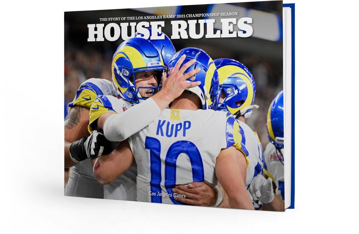 Cooper Kupp is embraced by the Rams on the cover a new Los Angeles Times book