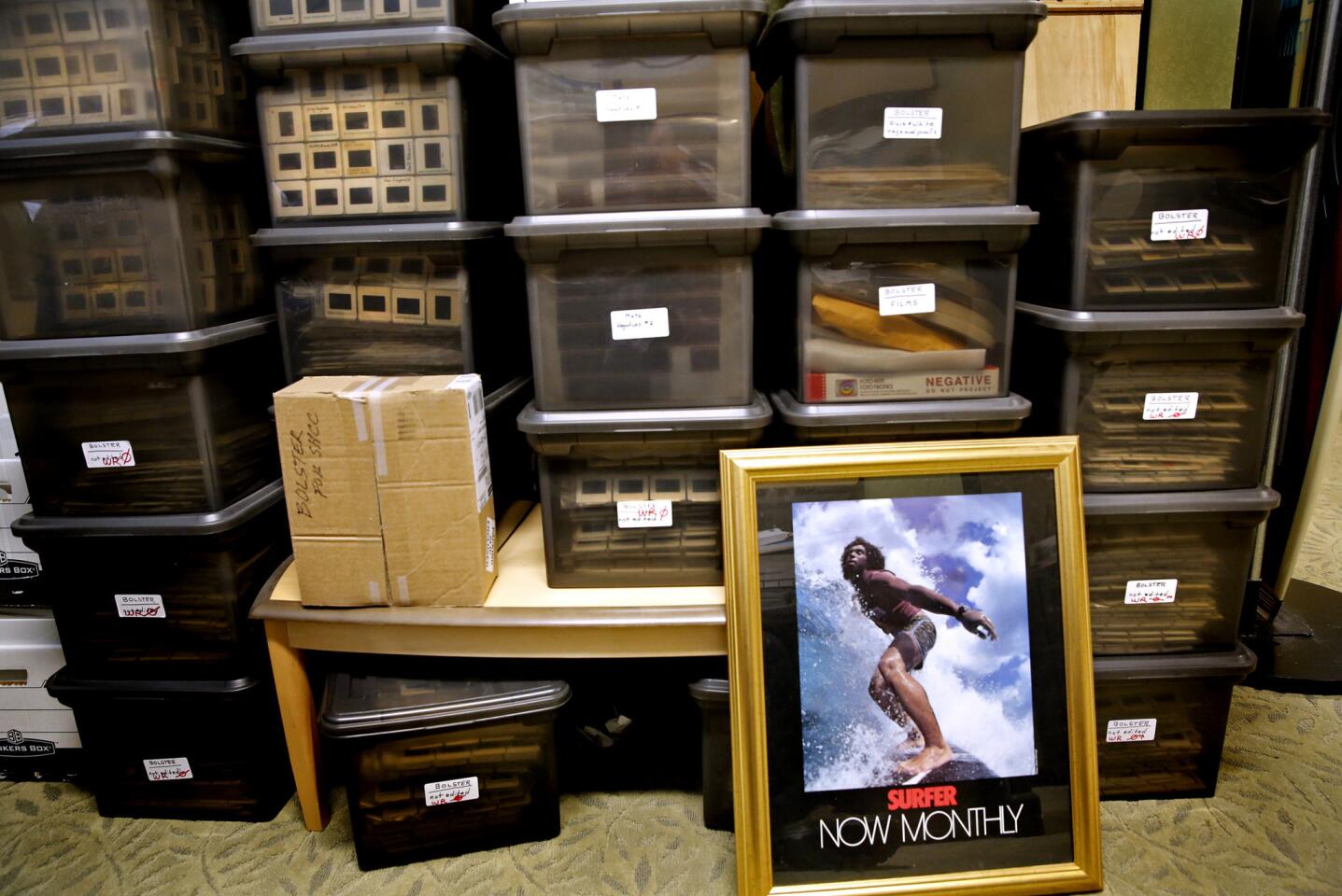 Thousands of slides from numerous photographers await digital scanning by archivist Steve Wilkings at the Surfing Heritage and Culture Center in San Clemente. Wilkings, a noted surf photographer in the 1960s and '70s, pioneered bolting a camera to the front of notable surfers' boards and triggering it from the beach by radio control.