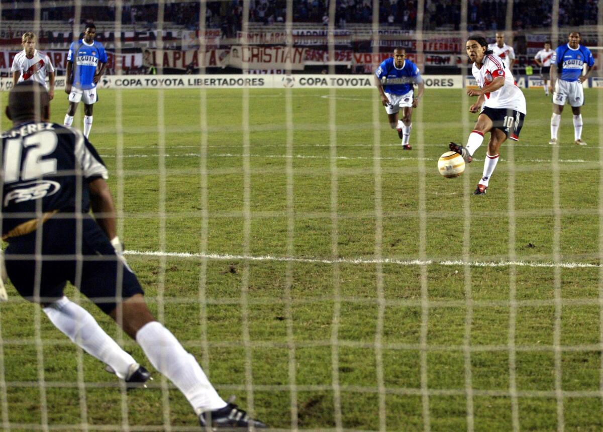 River Plate's Marcelo Gallardo converts a penalty kick, the second goal against Junior 07 April 2005 during their Libertadores Cup Group 5 soccer match held at the Monumental stadium in Buenos Aires, Argentina. AFP PHOTO STR (Photo credit should read STR/AFP/Getty Images) ORG XMIT: ARG012
