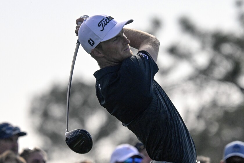 Will Zalatoris hits his tee shot on the 17th hole of the South Course during the third round of the Farmers Insurance Open golf tournament, Friday Jan. 28, 2022, in San Diego. (AP Photo/Denis Poroy)
