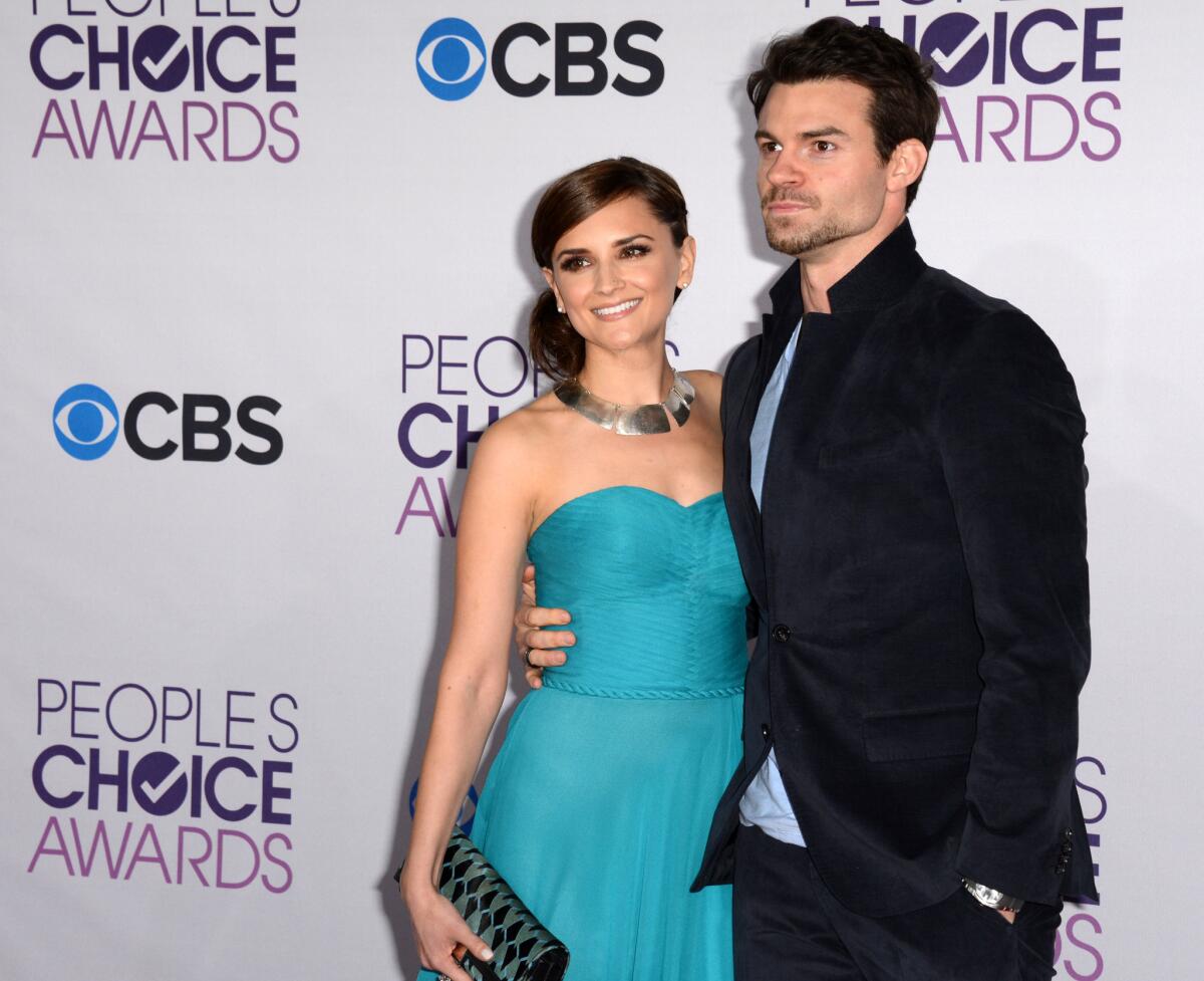 Rachael Leigh Cook and Daniel Gillies arrive at the 2013 People's Choice Awards at the Nokia Theatre in Los Angeles on Jan. 9, 2013.