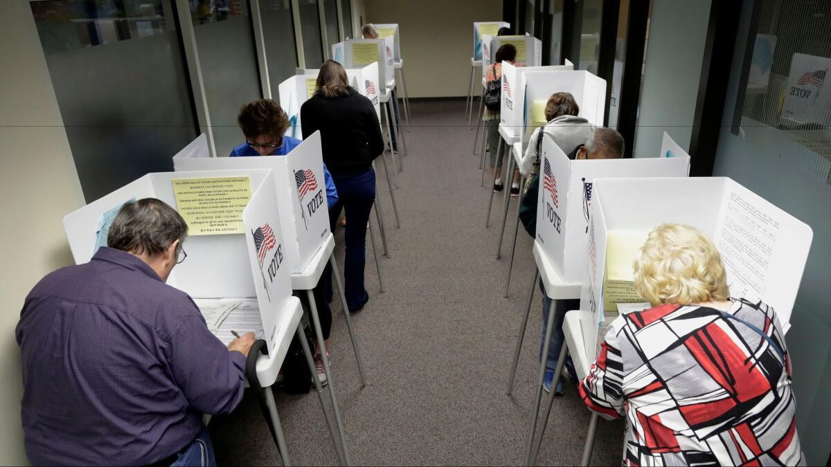 Voters cast ballots last week in San Jose.