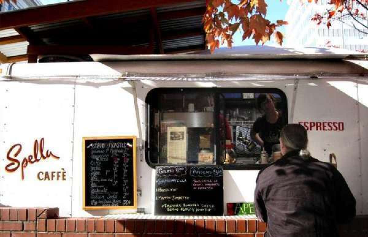 The corner of SW 9th Avenue and SW Alder Street is known as a food cart mecca. Its vendors have included Spella Caffe.