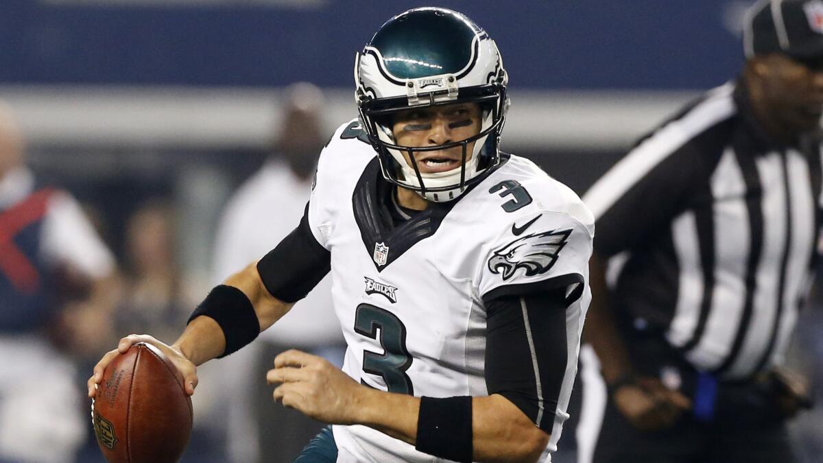 Philadelphia Eagles quarterback Mark Sanchez rolls out to pass during a 33-10 win over the Dallas Cowboys on Nov. 27.