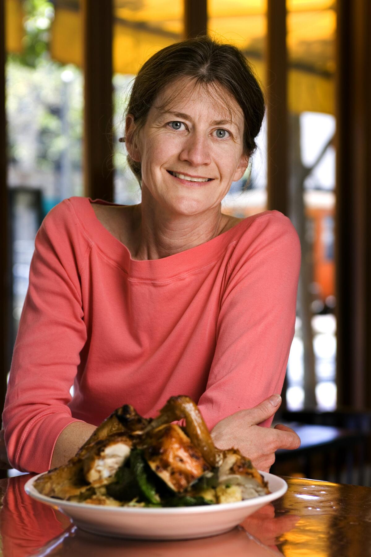Judy Rodgers with her Zuni Cafe roast chicken.