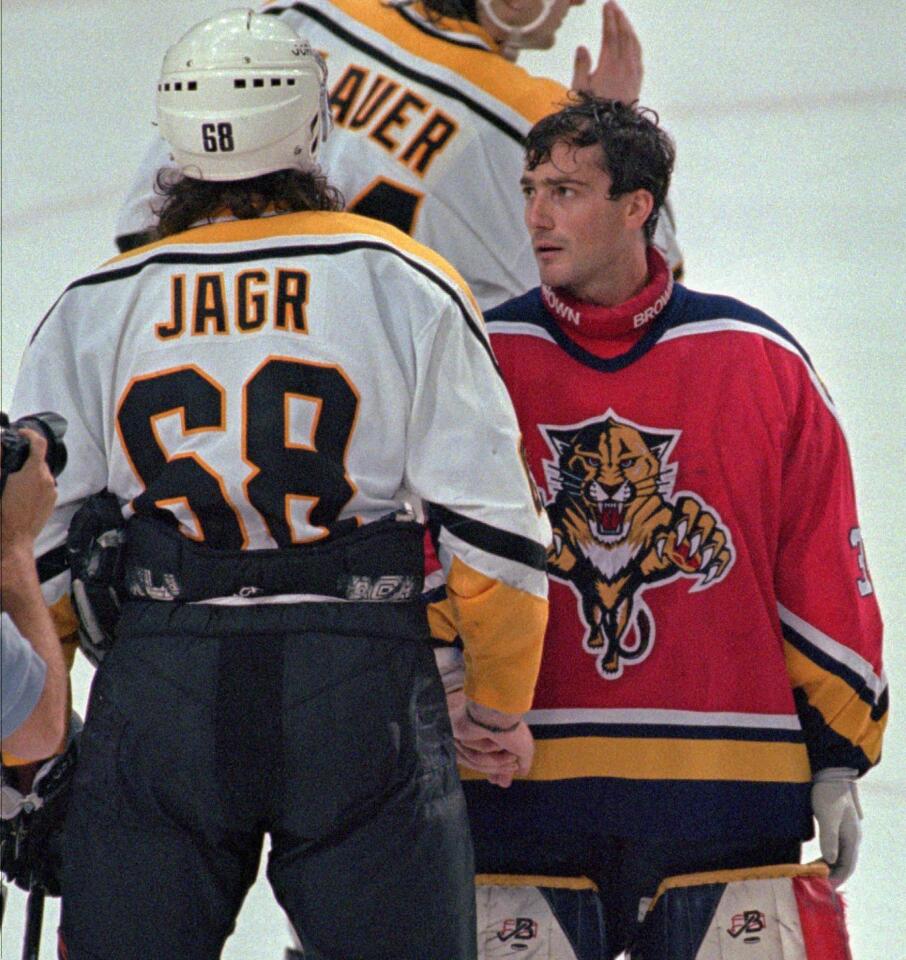 Florida Panthers goalie John Vanbiesbrouck, right, shakes hands with Pittsburgh Penguins Jaromir Jagr after game 7 of their Eastern Conference playoff series in Pittsburgh, Saturday June 1, 1996. The Panthers defeated the Penguins 3-1 and will meet the Colorado Avalanche in the Stanley Cup finals. (AP Photo / George Widman)
