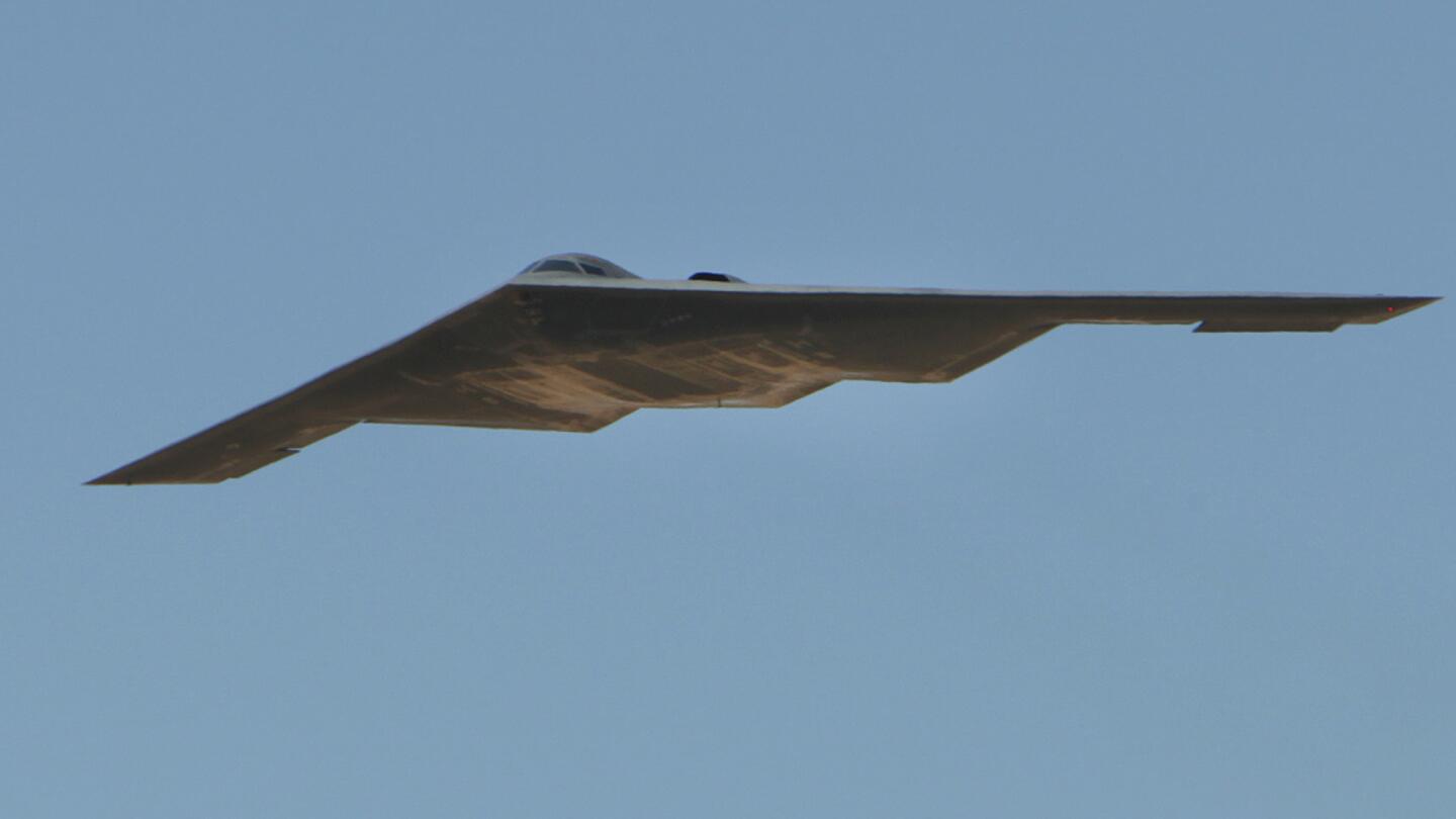 The Air Force's B-2 Spirit Stealth bomber "Spirit of Arizona" flies over the Northrop Grumman facility in Palmdale. Just as they had on that historic day 25 years ago, several hundred Northrop Grumman employees, civic leaders and Air Force personnel stood along the fence line to watch the bomber taxi onto the runway for the flight.