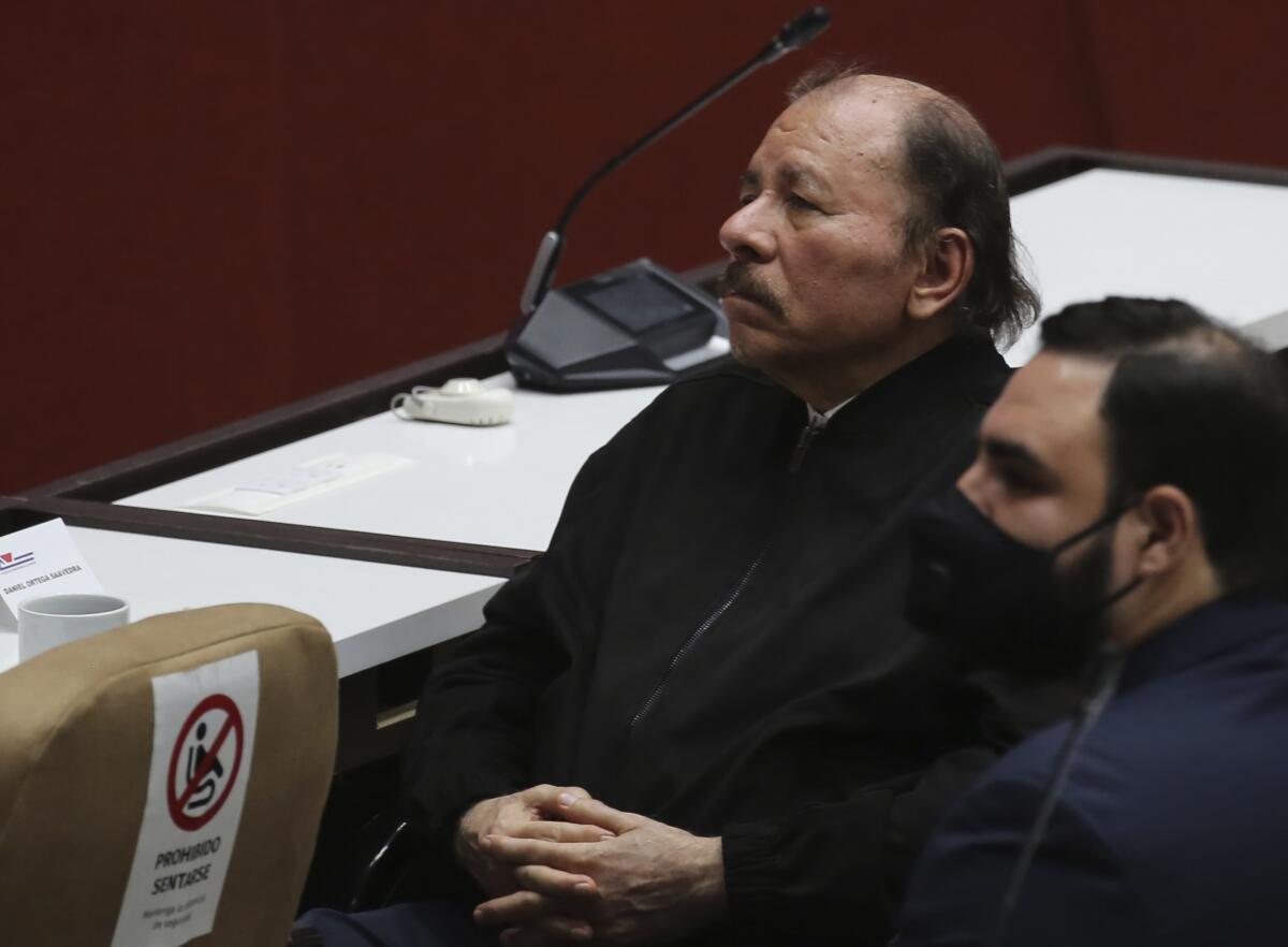 President of Nicaragua Daniel Ortega sits