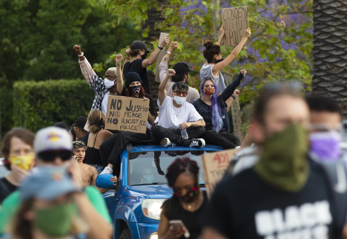 A crowd gathers outside Los Angeles Mayor Eric Garcetti's home on June 2 to protest police brutality.