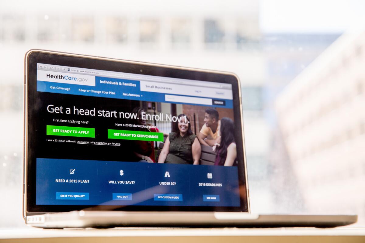 The federal HealthCare.gov website, where people can buy health insurance, is displayed on a laptop screen in Washington.