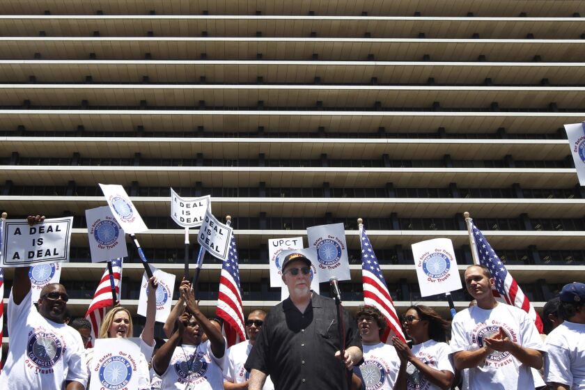 Department of Water and Power union boss Brian D'Arcy speaks at a rally outside the DWP on June 17.
