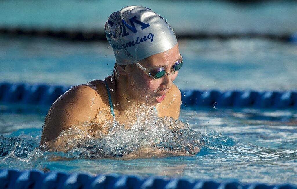 Corona del Mar's Nicole Lin competes in the 100-yard breastsroke during a Pacific Coast League meet against Irvine.