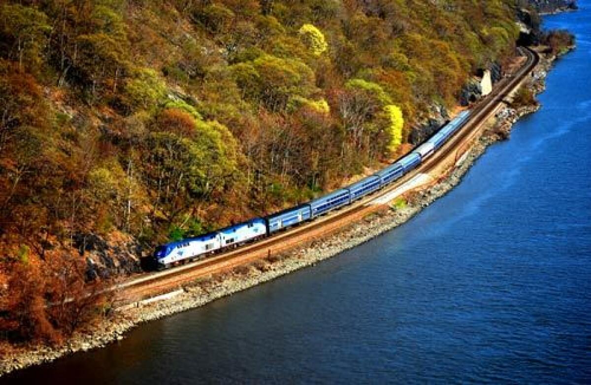 The Lake Shore Limited follows the curves of the Hudson River near Bear Mountain, N.Y., offering passengers spectacular spring views.