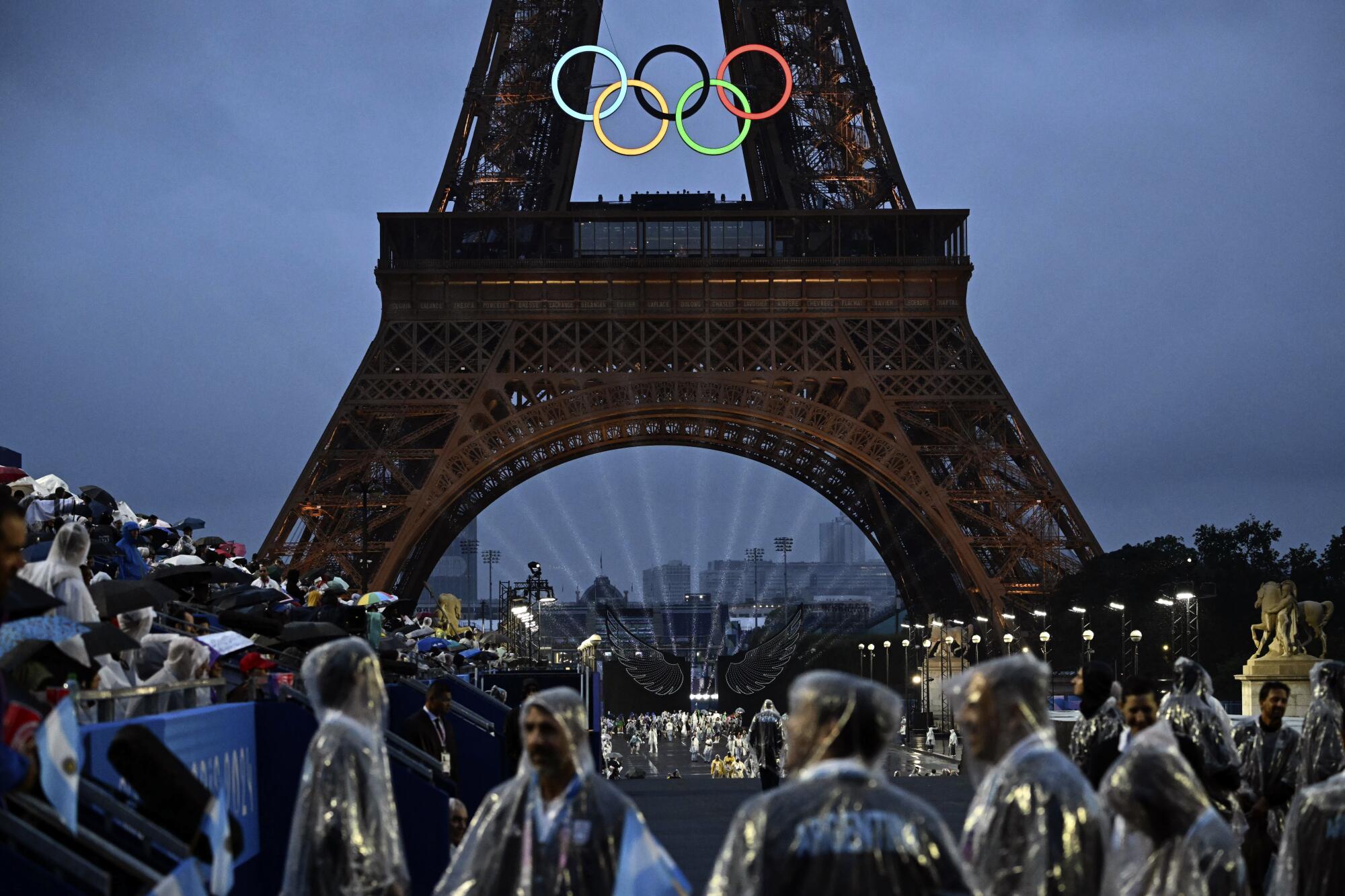 The Eiffel Tower and Olympic Rings are illuminated at the Trocadero during the opening ceremony.