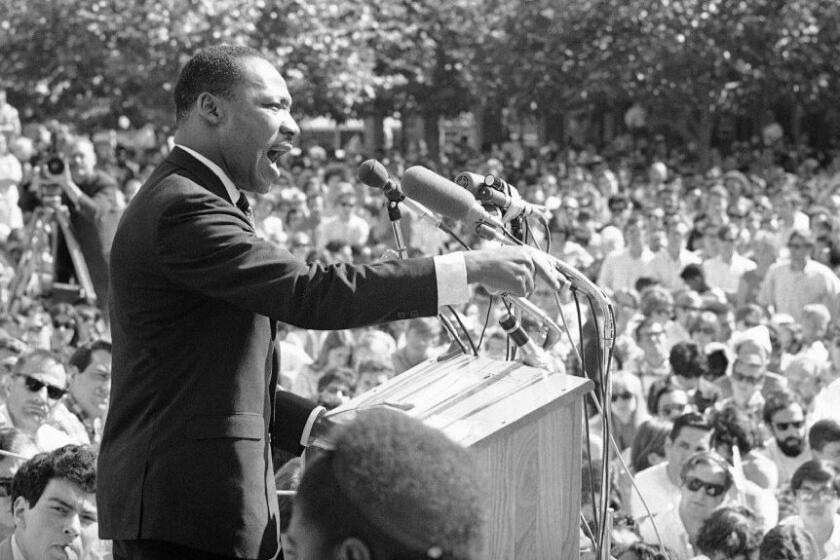 Dr. Martin Luther King Jr. speaks at the University of California administration building in Berkeley on May 17, 1967.