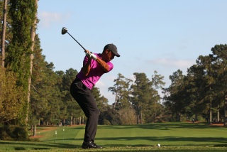 Tiger Woods of the United States plays his shot from the 17th tee.