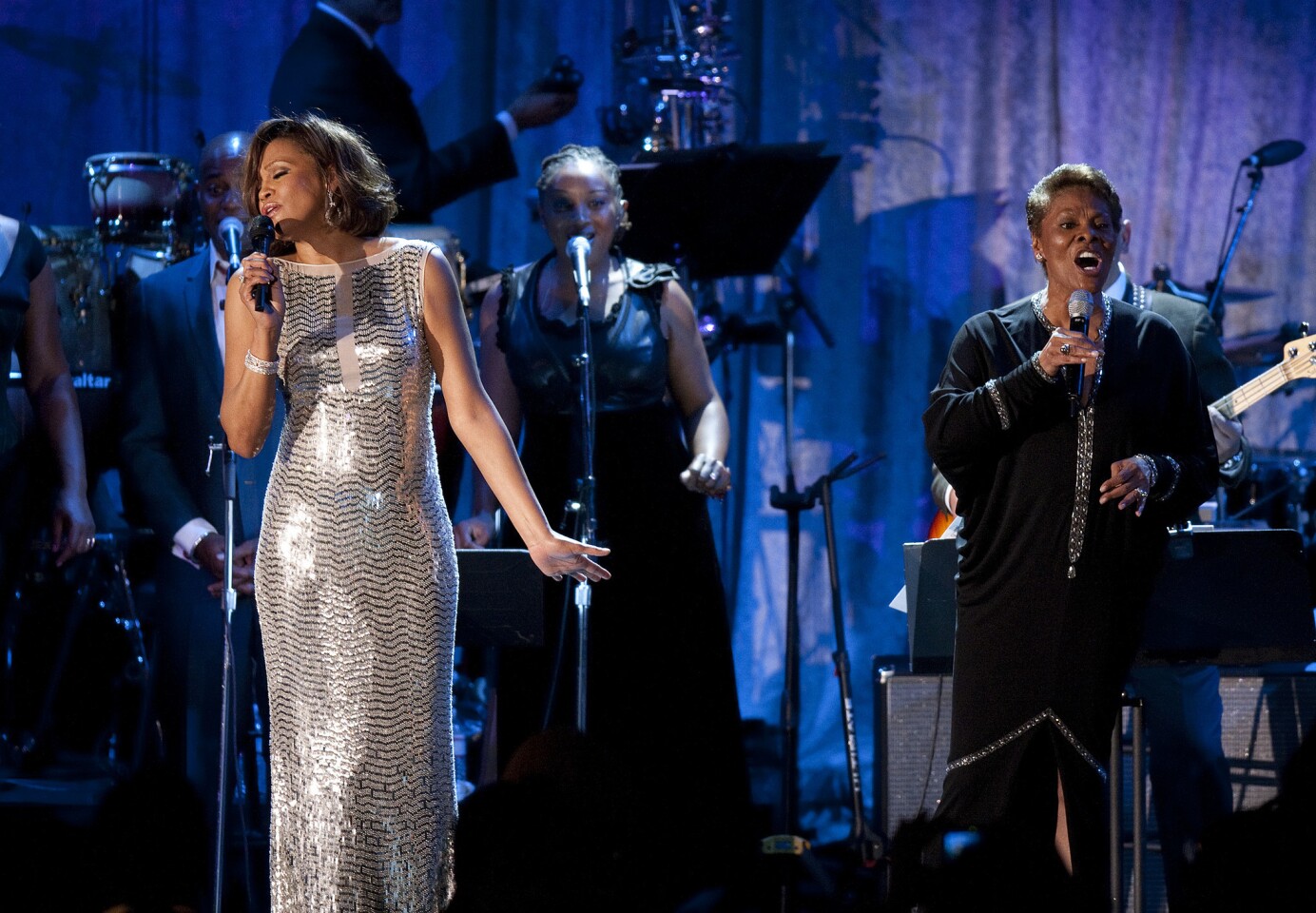 Whitney Houston and Dionne Warwick sing "That's What Friends Are For" at the 2011 Clive Davis pre-Grammy gala at the Beverly Hilton hotel.