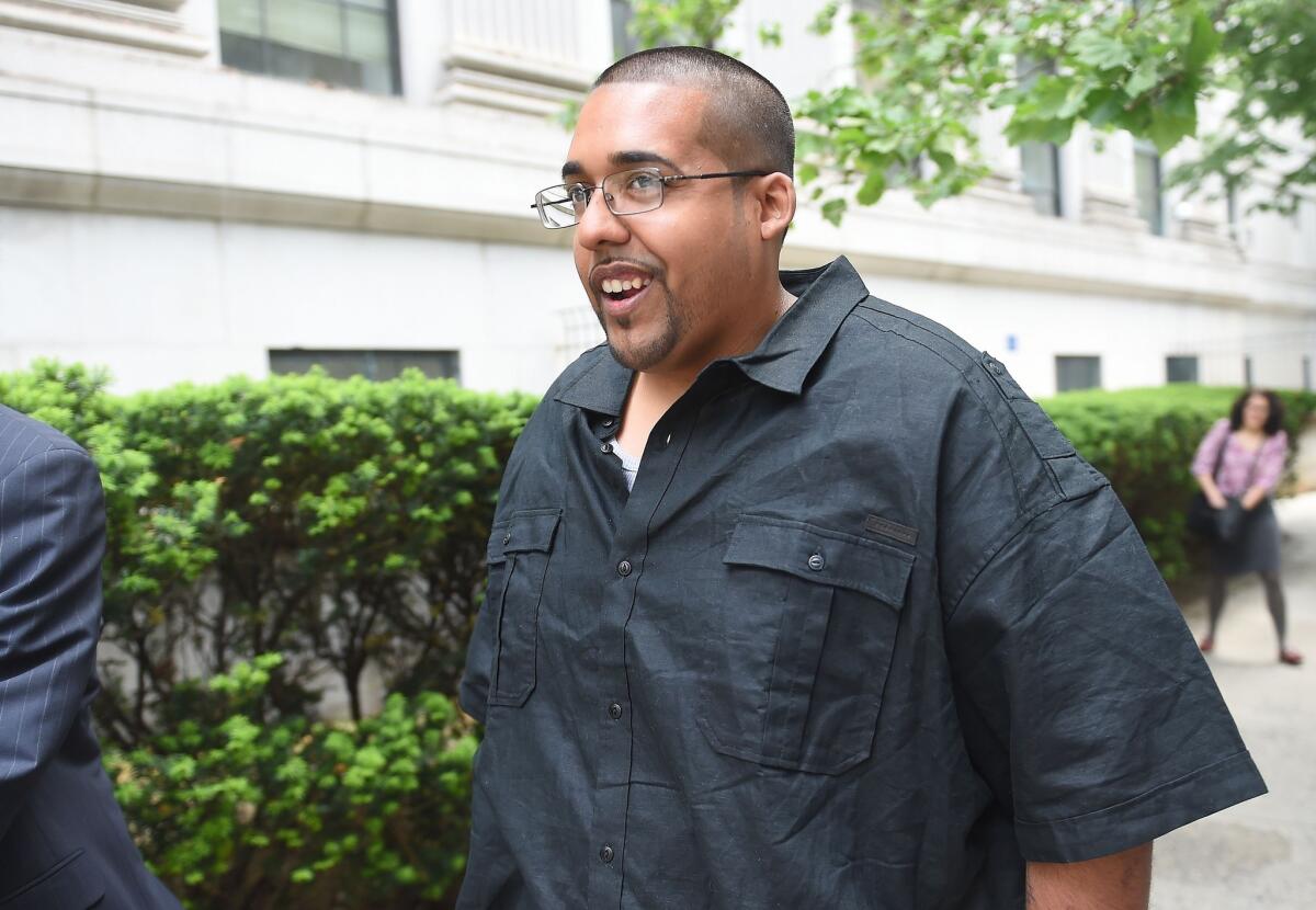 Hector Xavier Monsegur, also known as Sabu, leaves federal court in Manhattan after being sentenced to time served -- 7 months -- since his arrest on hacking charges. Prosecutors requested lenience in exchange for Monsegur's cooperation with the FBI.