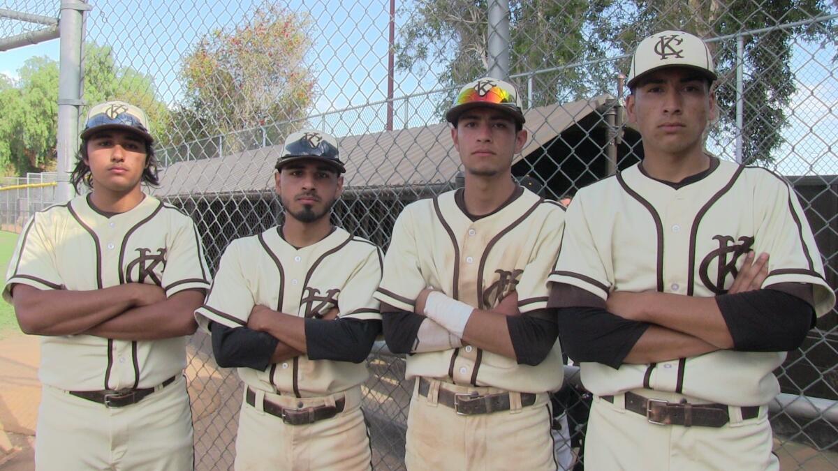 Kennedy's two sets of brothers Andrew Olivas (left), Jose Olivas, Luis Campos and Adrian Campos helped lead the Golden Cougars past San Fernando.