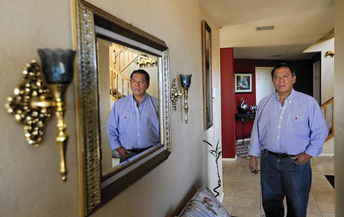 Jesus Sequeira, whose income plunged after his wife died, is fighting to save his Canyon Country home. But there’s a glitch: Even though he was listed on the title, only his wife was on the mortgage note.