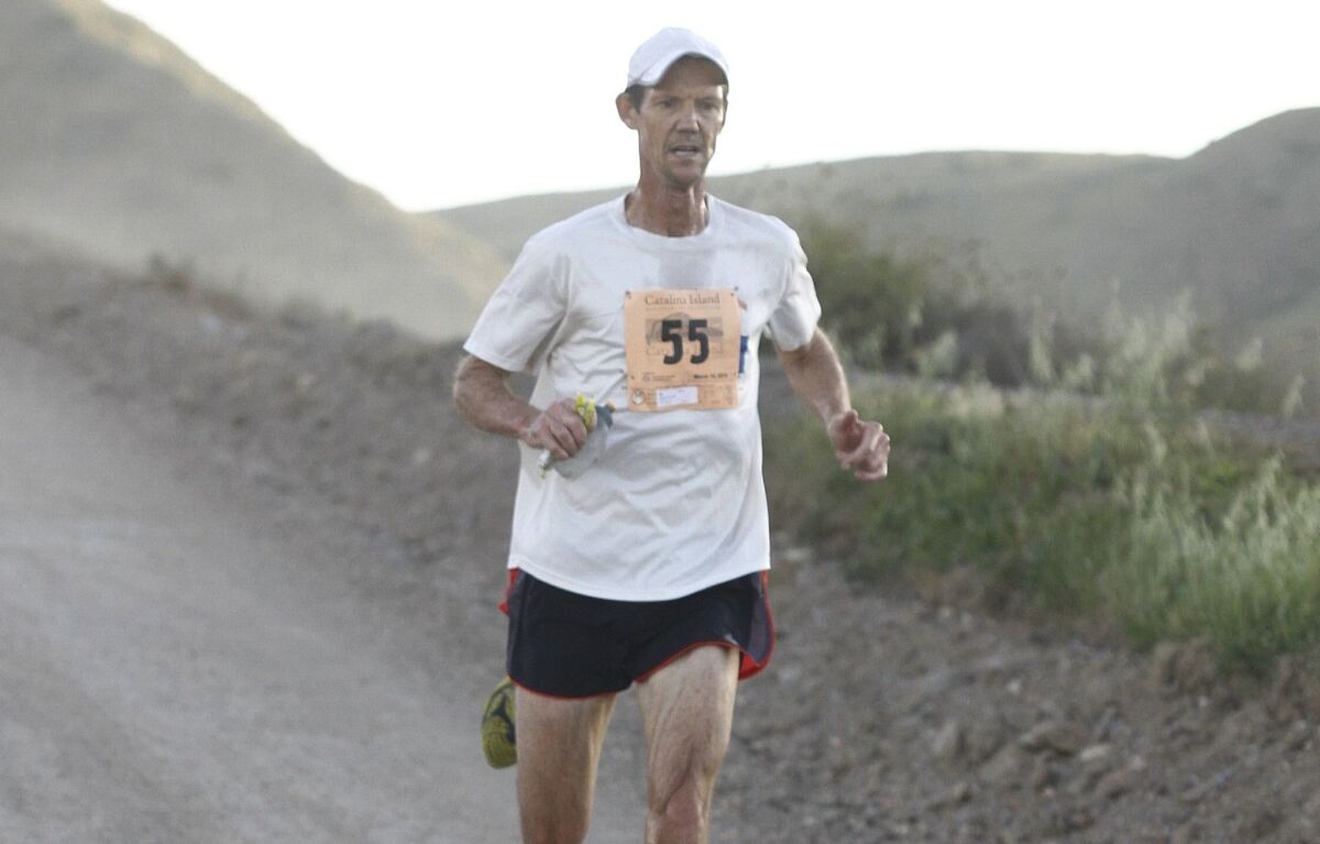 Encinitas resident Jeff Creighton powers through the Catalina Island Marathon. In challenging conditions, he became the oldest in the marathon’s history to come in first.