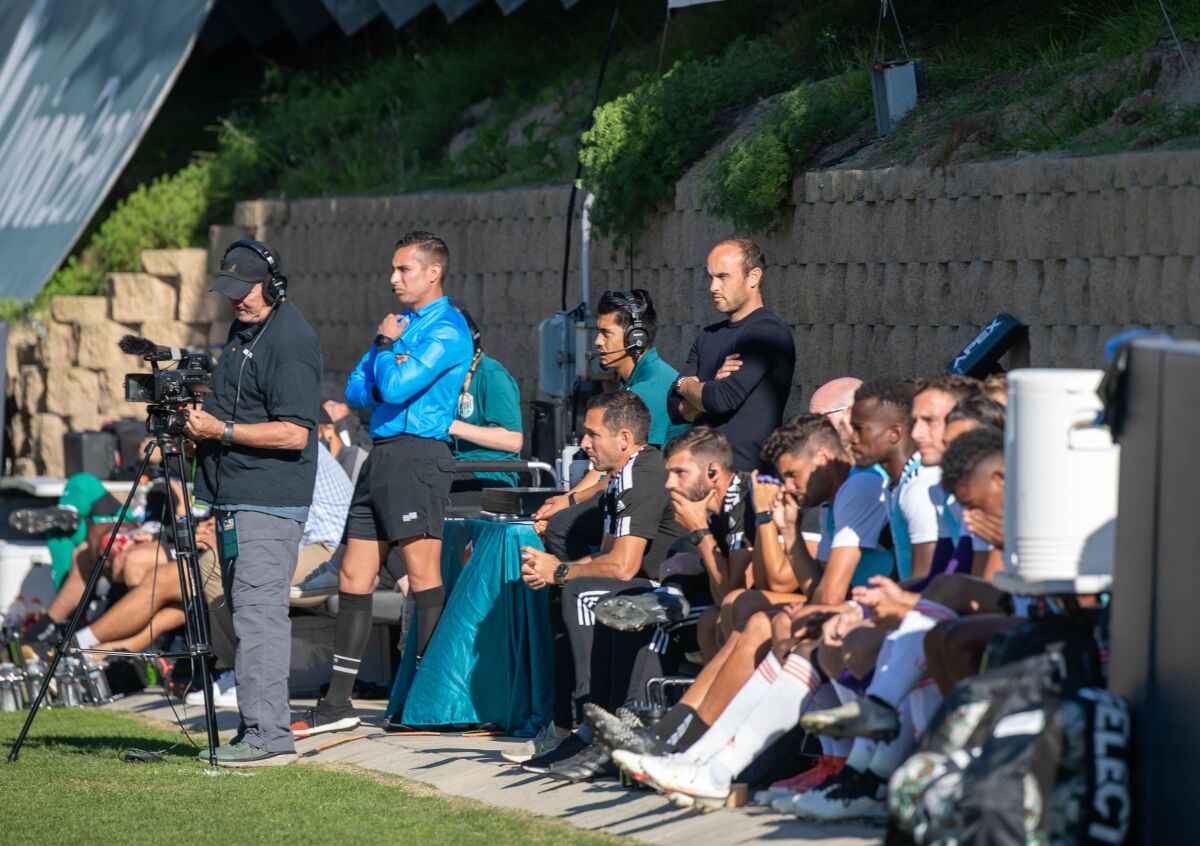 SD Loyal coach Landon Donovan (center, dark sweater) will be taking his team into a playoff game for the first time Friday.