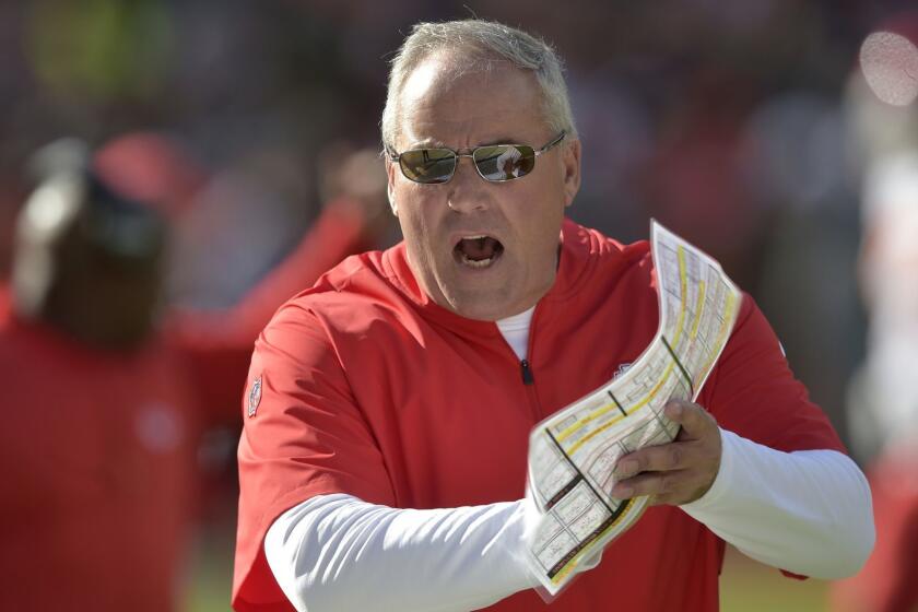 File-This Nov. 4, 2018, file photo shows Kansas City Chiefs defensive coordinator Bob Sutton walking on the sideline during an NFL football against the Cleveland Browns in Cleveland. The Chiefs have fired Sutton after a second-half collapse in the AFC championship game, including an overtime period in which Kansas City failed to stop the New England Patriots on what turned out to be the only possession. The Patriots won the game 37-31 to reach their third consecutive Super Bowl. Chiefs coach Andy Reid announced the firing in a statement Tuesday, Jan. 22, 2019, one day after he said he was evaluating all aspects of the team. Reid declined to address Sutton specifically. (AP Photo/David Richard, File)