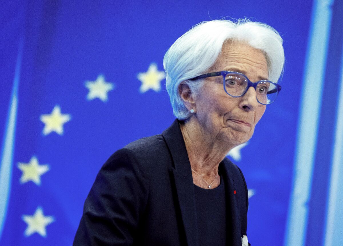 FILE - Christine Lagarde, President of the European Central Bank listens during a news conference in Frankfurt, Germany, July 21, 2022. Lagarde says she doesn't believe inflation has peaked after reaching the highest levels on record and that the bank isn’t through raising interest rates to combat those price spikes. Lagarde told European lawmakers Monday, Nov. 28, 2022 that there's too much uncertainty to know whether inflation, which hit 10.6% in October, would come down soon in the 19 countries that use the euro currency. (AP Photo/Michael Probst, File)