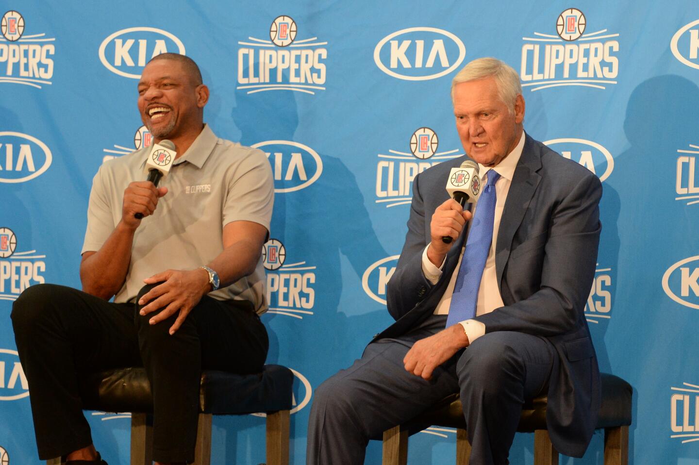 Jerry West and Clippers coach Doc Rivers speak during a news conference introducing West as a consultant for the team.