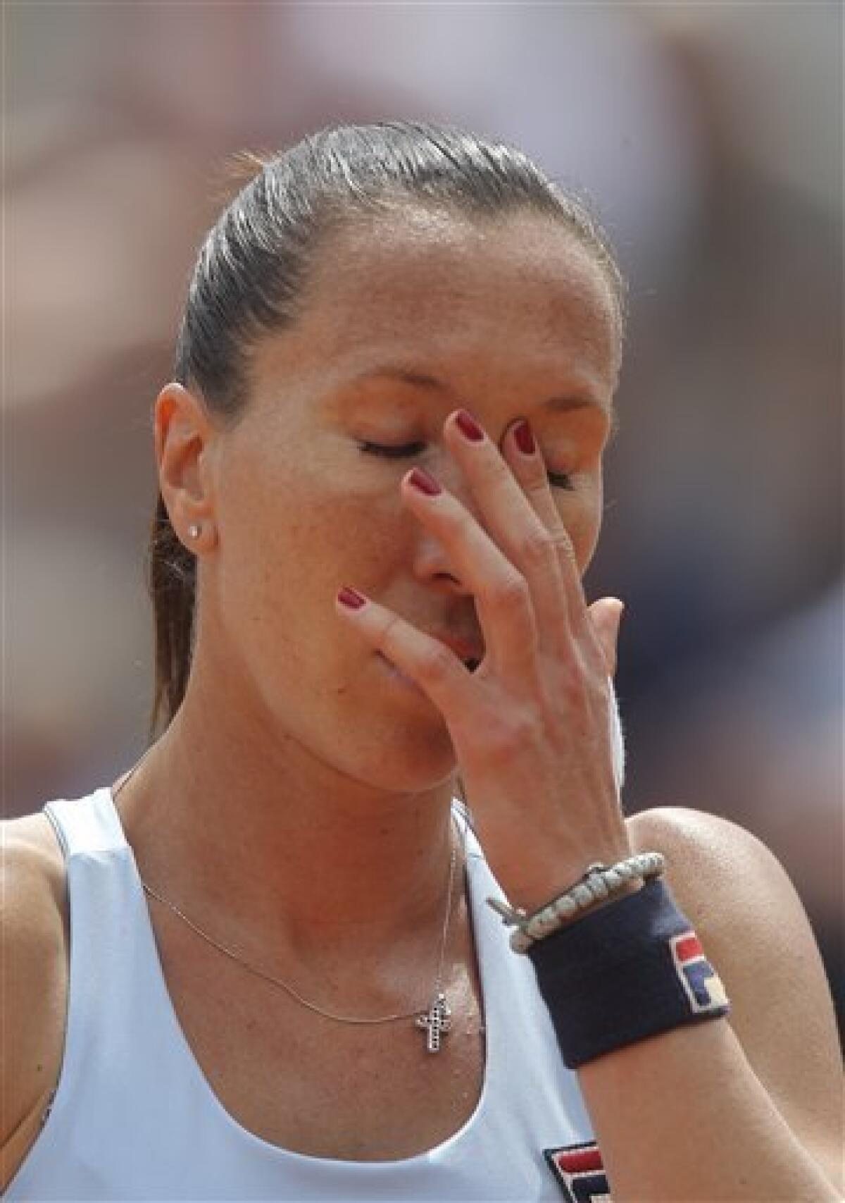 Jelena Jankovic of Serbia looks dejected during her third round