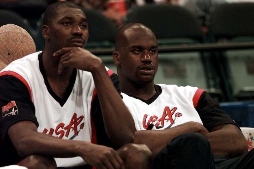 Hakeem Olajuwon, left, and Shaquille O'Neal were teammates for the U.S. in the 1996 Olympics.