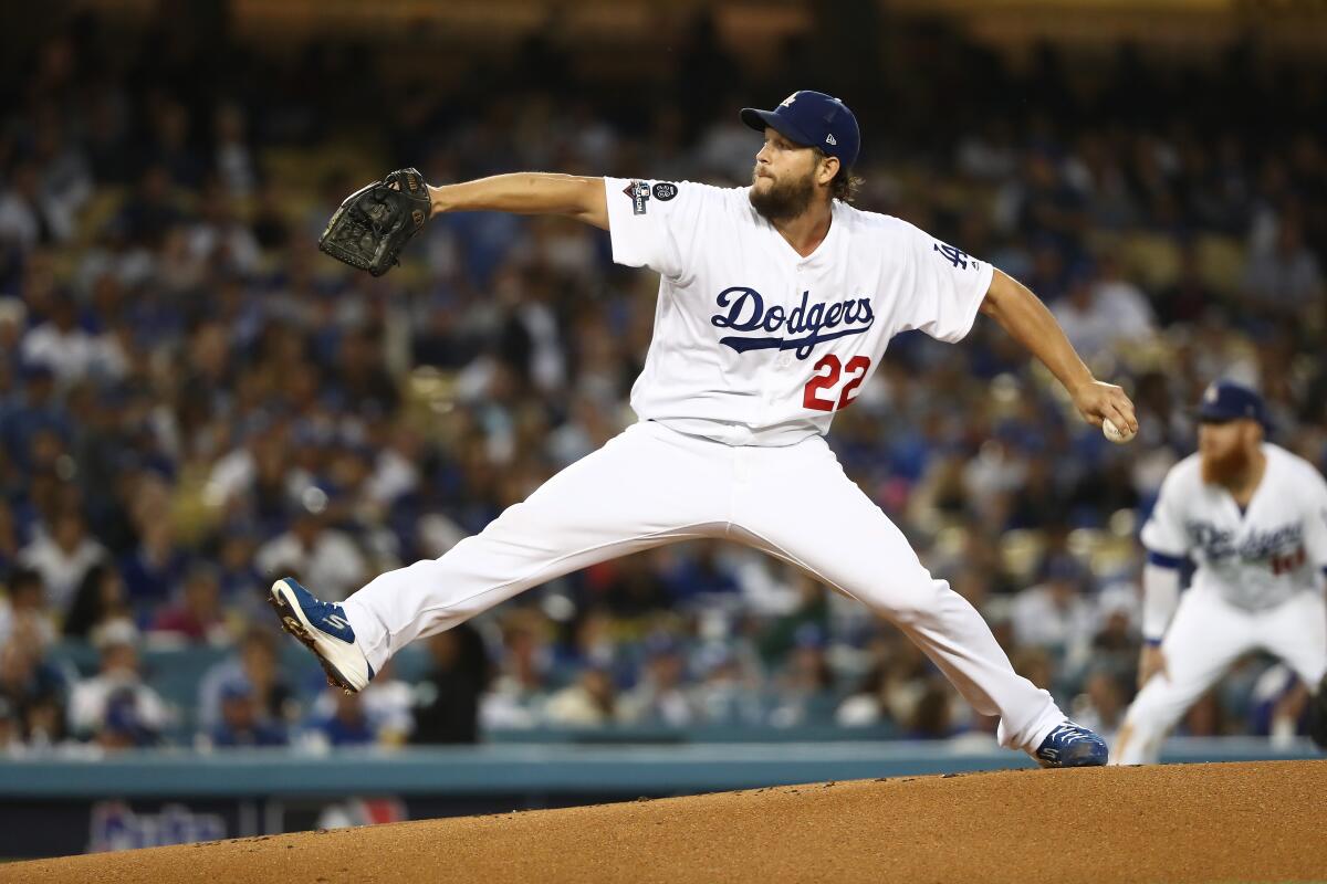 Dodgers pitcher Clayton Kershaw pitches against the Washington Nationals in the NLDS at Dodger Stadium.
