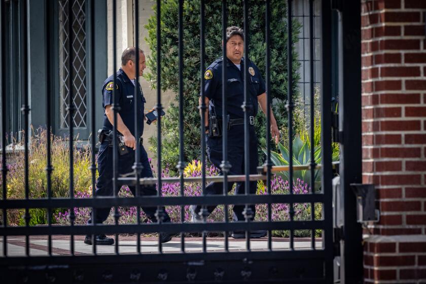 Los Angeles, CA - April 22: Police patrol Getty House, the official residence of the Mayor Karen Bass, where a man was taken into custody for allegedly smashing a glass door and breaking into her home on Monday, April 22, 2024 in Los Angeles, CA. (Jason Armond / Los Angeles Times)