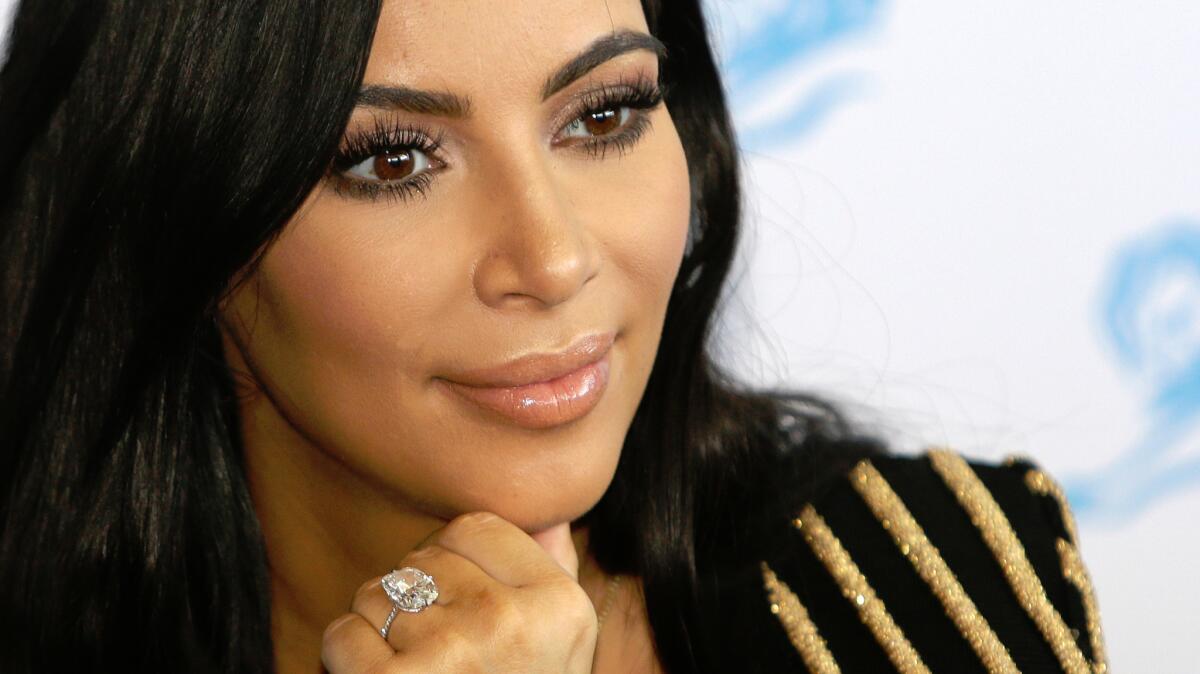 Kim Kardashian was robbed at gunpoint in Paris on Sunday, after attending Fashion Week.