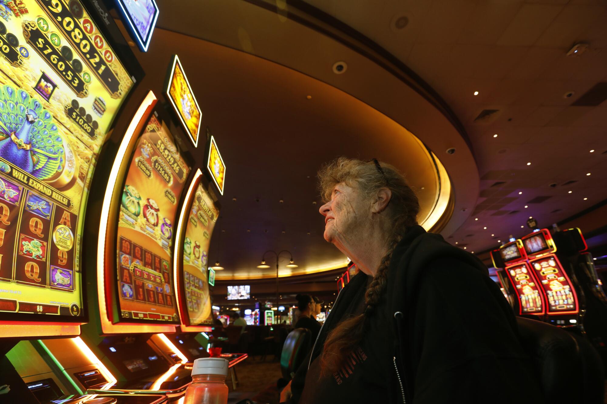 Visitors play slot machines at the Win-River Resort & Casino.