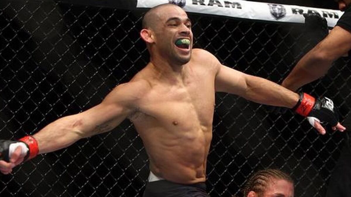 Renan Barao celebrates after his first-round bantamweight title victory over Urijah Faber at UFC 169 at the Prudential Center in Newark, N.J., on Feb. 1, 2014.