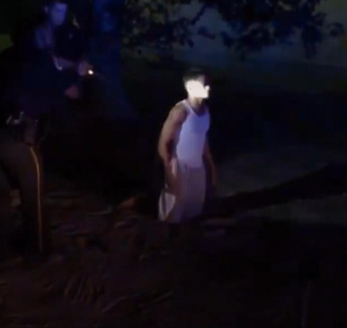 This image from a video provided by Brandon Woodson and taken Oct. 8 shows a police encounter with Prairie View, Texas, City Councilman Jonathan Miller.