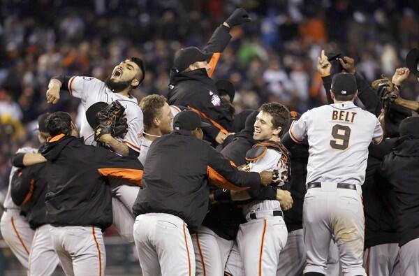 The Giants celebrate clinching the World Series title with a 4-3 victory over the Tigers in Game 4 on Sunday night at Comerica Park in Detroit.