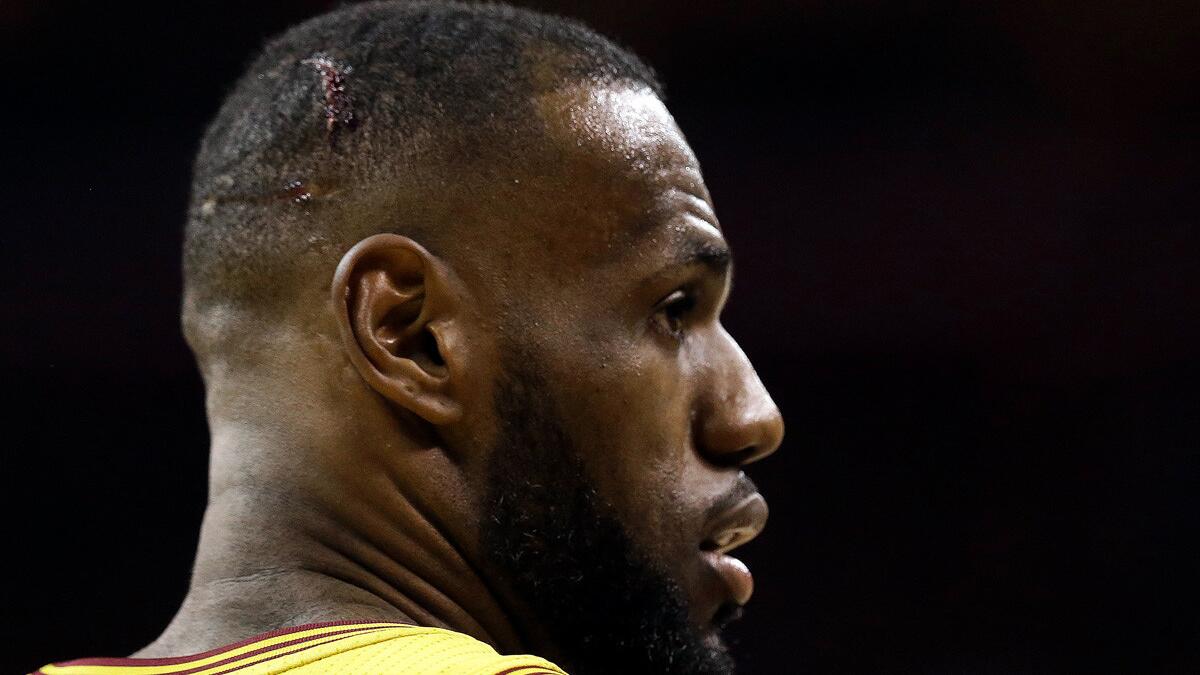 LeBron James pushed out of the way of brawl after Cavs' Game 2 loss