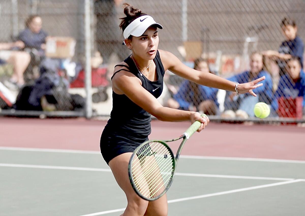 Granada Hills’ Leah Lazarian volleys in her first set at No. 3 singles on October, 25, 2023.