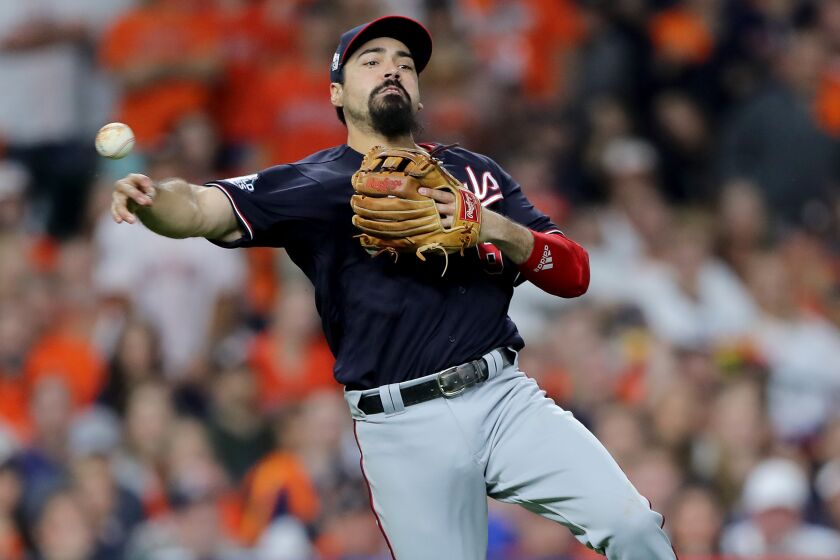 HOUSTON, TEXAS - OCTOBER 29: Anthony Rendon #6 of the Washington Nationals throws out the runner against the Houston Astros during the eighth inning in Game Six of the 2019 World Series at Minute Maid Park on October 29, 2019 in Houston, Texas. (Photo by Elsa/Getty Images)