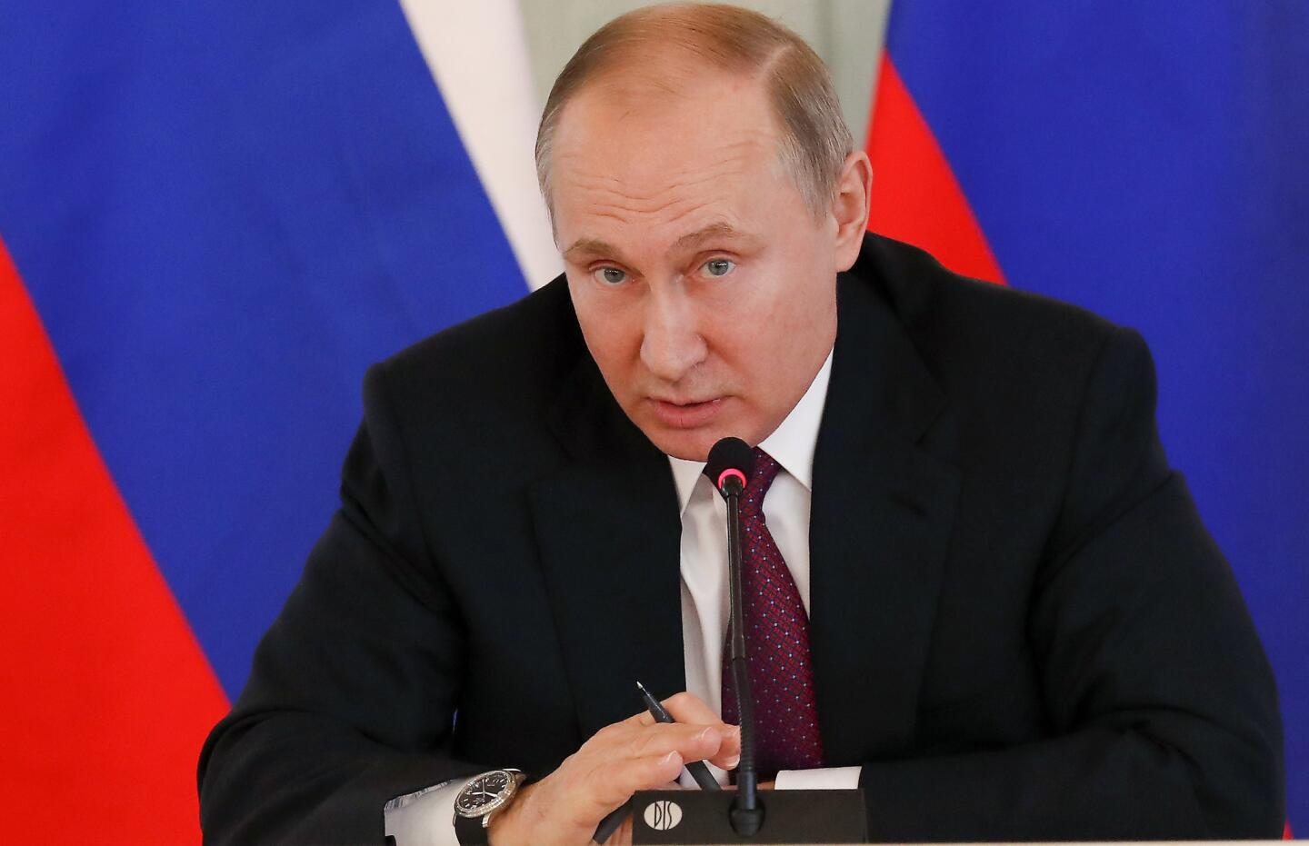 Russian President Vladimir Putin acknowledged that some "patriotic" individuals may have engaged in hacking in the U.S. election, but continues to deny government involvement. After President Barack Obama announced sanctions on Russian spy agencies and expelled 35 diplomats, Putin declined to immediately retaliate, drawing praise from President-elect Donald Trump. On Jan. 17, 2017, Putin took a parting shot at the Obama administration, accusing it of trying to undermine Trump's election and calling a dossier alleging Russian spy agencies collected compromising material on Trump as "nonsense." After a report that Trump revealed classified information in a May 10 meeting with Russian diplomats, Putin offered to turn over to Congress records of the discussion. In a June 2017 interview with NBC's Megyn Kelly, Putin dismissed as "a load of nonsense" that Russia has damaging information on Trump. After 13 Russians were indicted by the United States in February 2018 for election-meddling, Putin insisted they didn't act on behalf of his government. Putin won re-election as Russian president on March 18, 2018, and received a phone call from Trump, congratulating him on the victory.