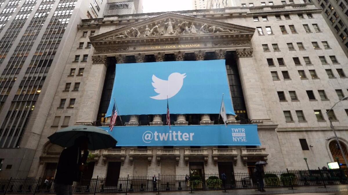 Twitter's banner hangs at the New York Stock Exchange in November 2013.