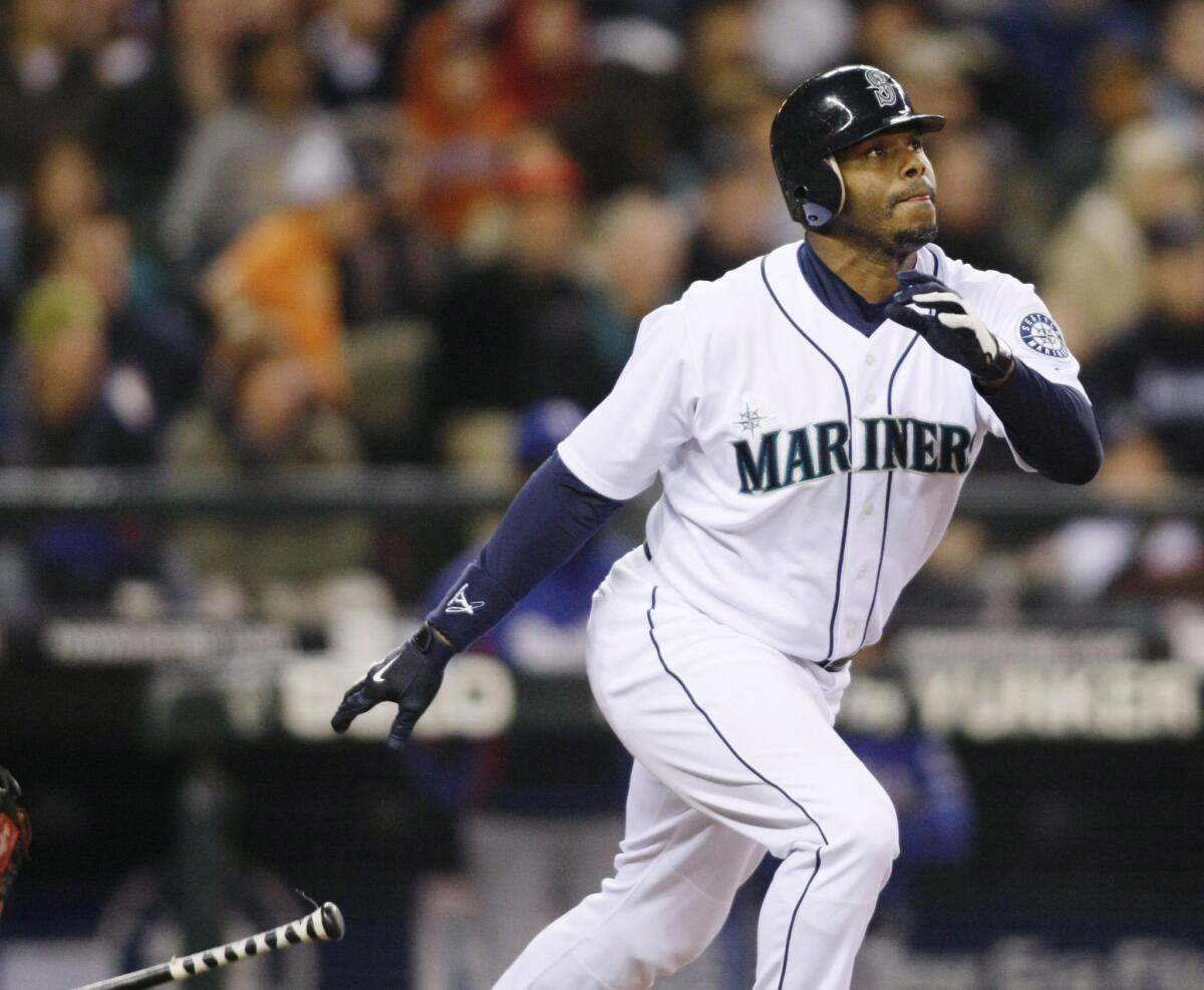 Ken Griffey Jr. hits a home run for Seattle in 2009.