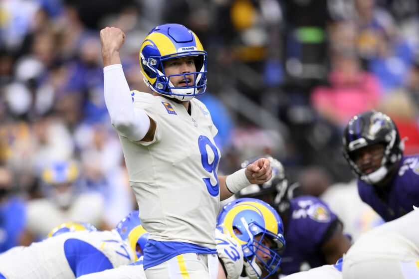 Los Angeles Rams quarterback Matthew Stafford (9) in action during the first half of an NFL football game against the Baltimore Ravens, Sunday, Jan. 2, 2022, in Baltimore. (AP Photo/Nick Wass)