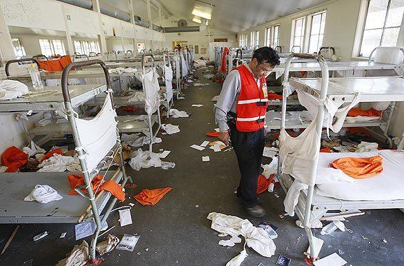 State environmental engineer checks for hazards before the cleanup can begin.