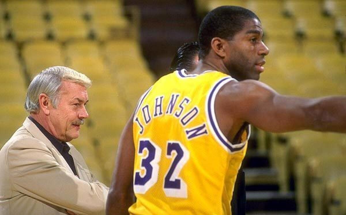 Jerry Buss' Lakers drafted Magic Johnson with the No. 1 overall pick in the NBA draft in 1979. (Ken Levine / Getty Images)