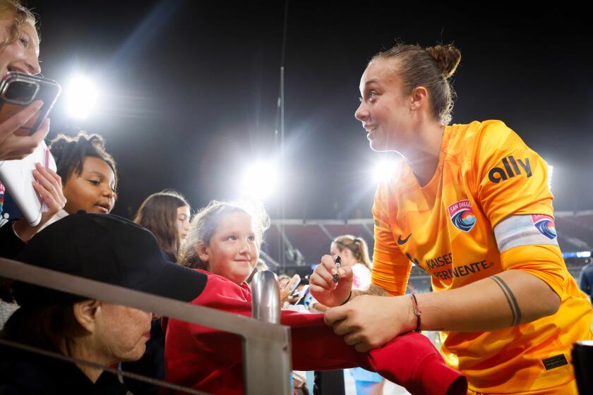 San Diego, CA - May 08: San Diego Wave FC goalkeeper Kailen Sheridan (1) signs autographs for fans after their match against Utah Royals FC at Snapdragon Stadium on Wednesday, May 8, 2024 in San Diego, CA. (Meg McLaughlin / The San Diego Union-Tribune)